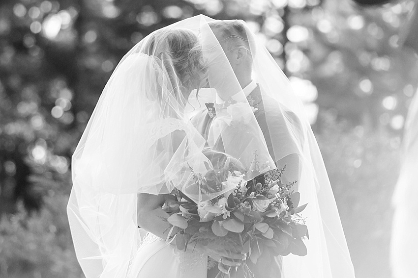 bride, groom, first kiss